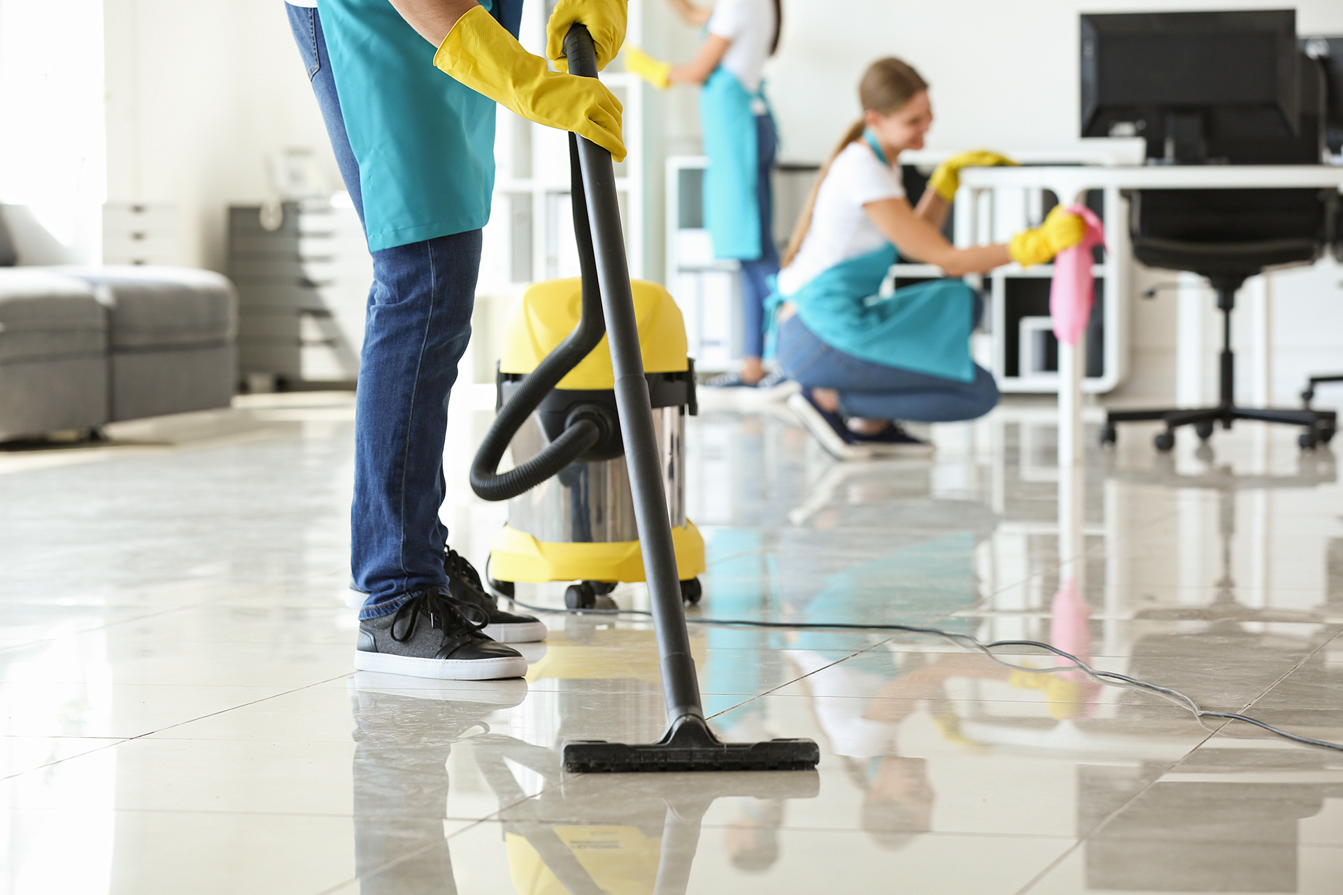 cleaning staff working on office